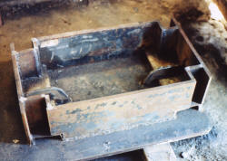 Gusset plates on the inside of the box add strenght to the inside of the fork lift channels to prevent breaking of the channels when lifting hammer