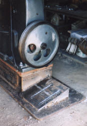Motor mount welded in place under flywheel