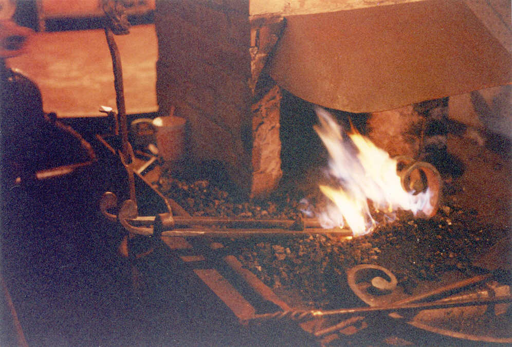 Heating scrolls for an ornamental gate.