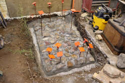 Stone foundation for new stone forge completed June 14, 2024