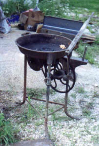 Portable forge with lever operated blower