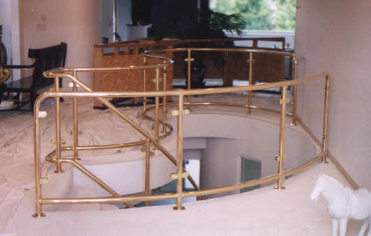 Modern style brass and glass railing