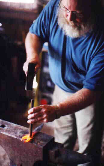 Carving facial features on a Gargoyle.